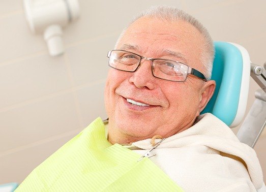 Man in dental chair for denture consultation