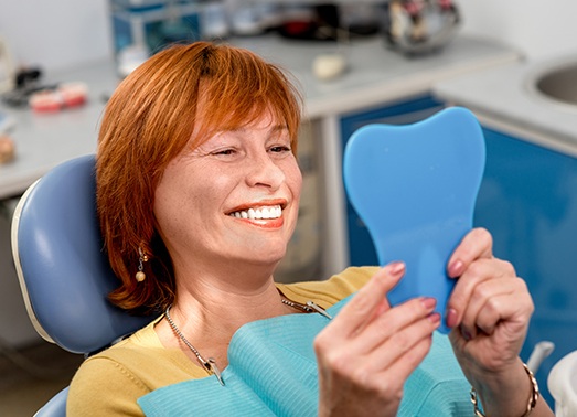 Woman with acrylic partial denture