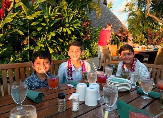 Doctor Patel's kids smiling on a vacation