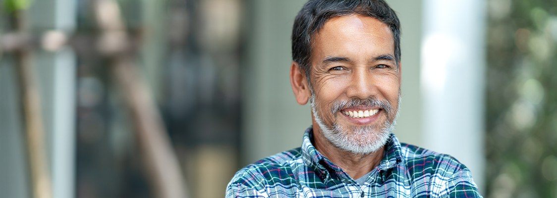 Man smiling after IV dental sedation visit